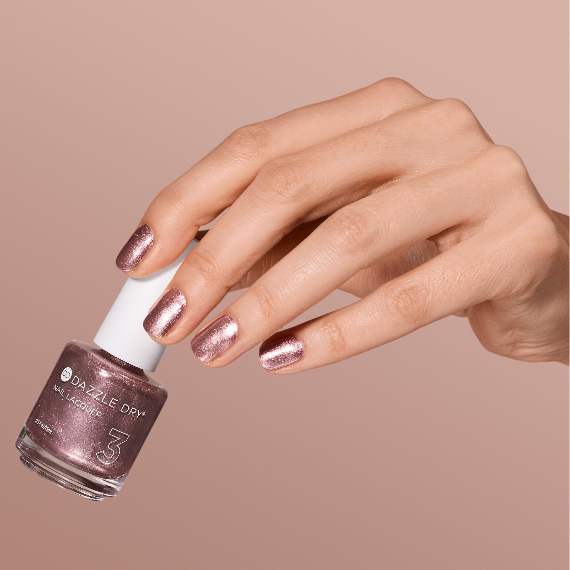 Dazzle Dry Out N' About rosa-oro metalico, proteccion de la uña.