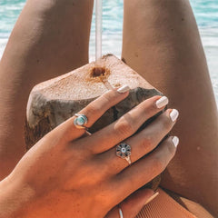 Dazzle Dry Rose Quartz swatch highlights natural nail peeking through a rosy glow.