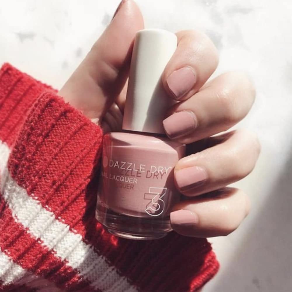 Dazzle Dry Strawberry Macaron swatches reveal a pale strawberry tone on skin.