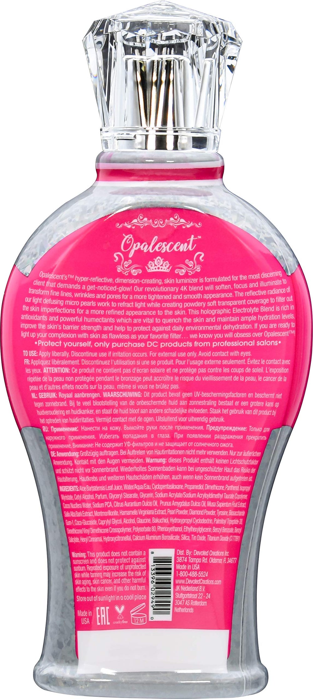Devoted Creations Opalescent Lotion de bronzage – texture tourbillon et micro-sphères pour un éclat holographique.