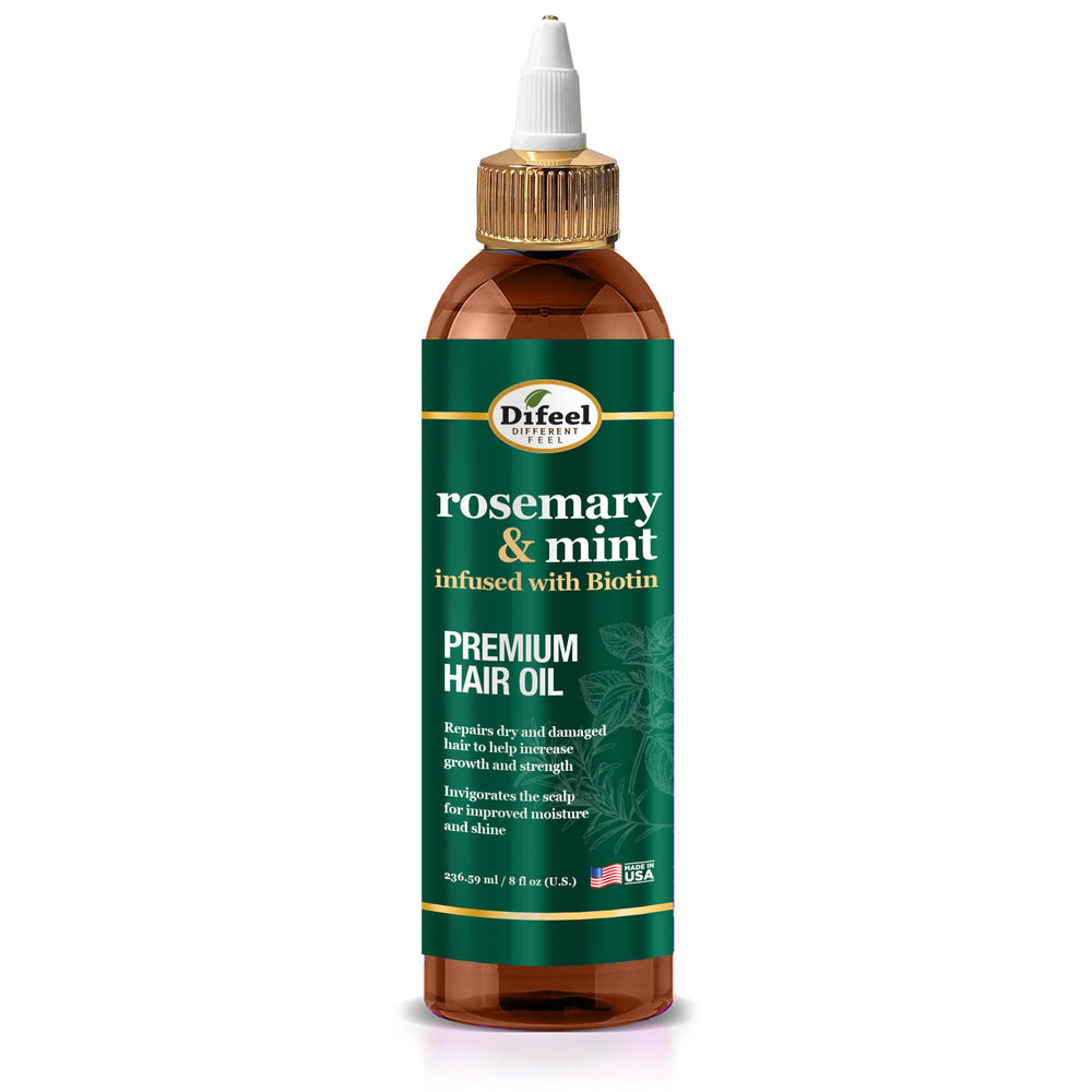 Difeel aceite romero-menta en botella para revitalizar el cabello.