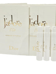 Dior J'adore L’Or Essence De Parfum, muestra en empaque compacto para viaje diario.