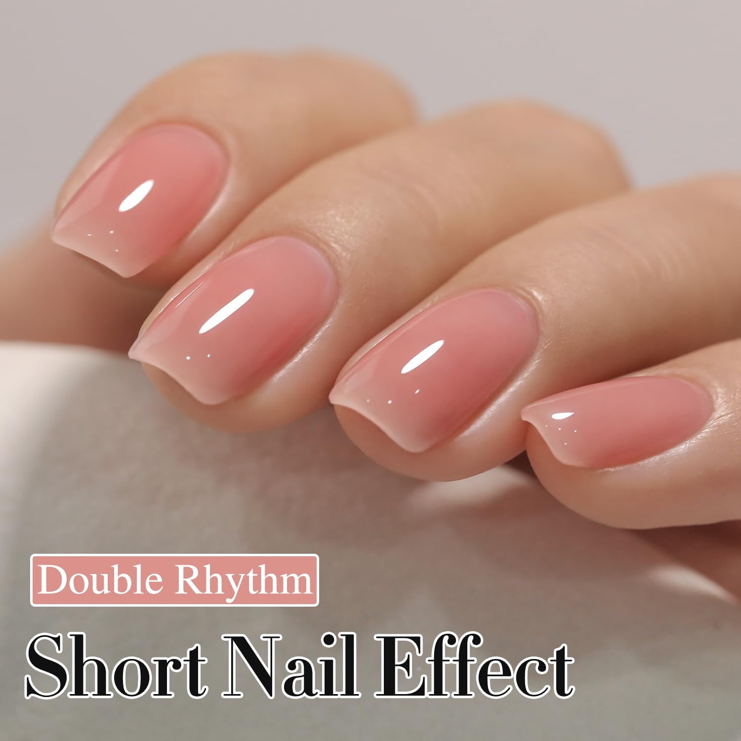 Double Rhythm gel rosado claro aplicado en uñas para un acabado pulido.