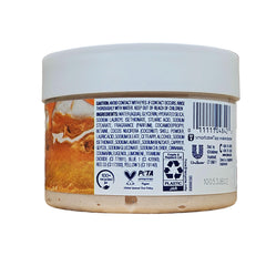 Dove exfoliante corporal navideño, aroma cálido para un ritual relajante.