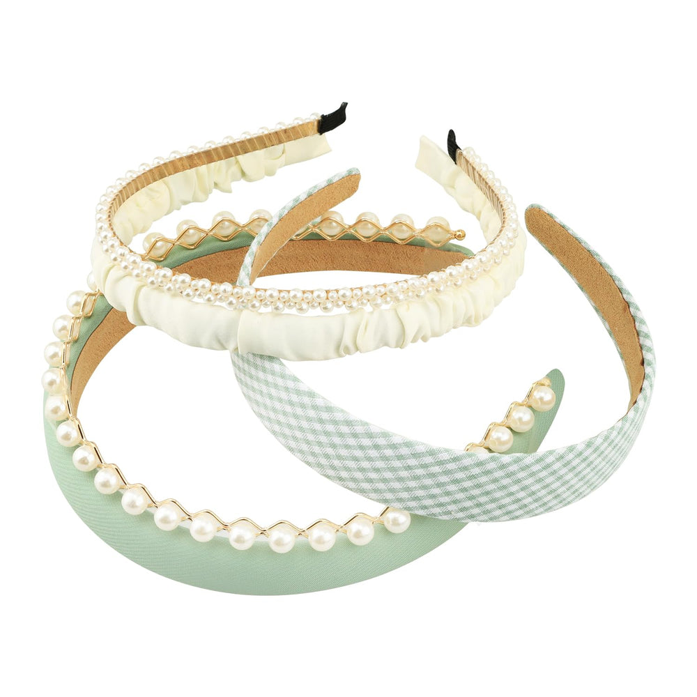 Diadema acolchada verde con ajuste elástico para uso diario.