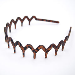 Dresyu Zigzag con dientes integrados para fijar el cabello con facilidad.