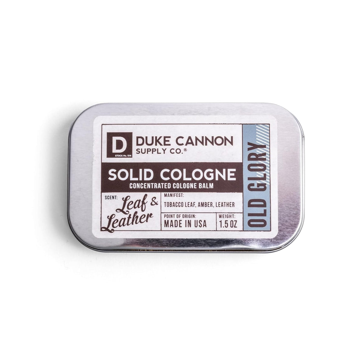 Duke Cannon Old Glory solid cologne tin front, portable fragrance for on-the-go refreshment.