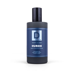 Duke Cannon Proper Cologne Huron cap closeup emphasizes premium fragrance oils.