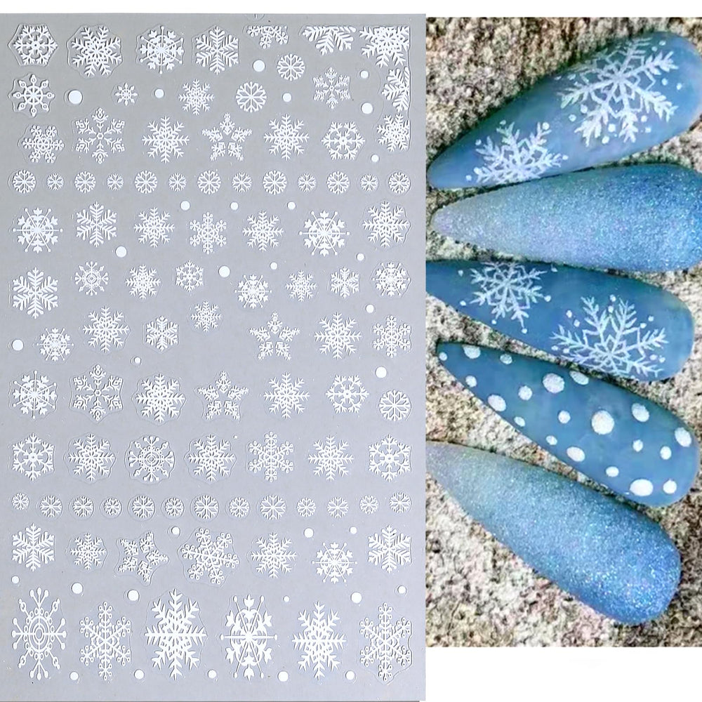 Arte de uñas con copos de nieve de DZHILHMX, estilo festivo.