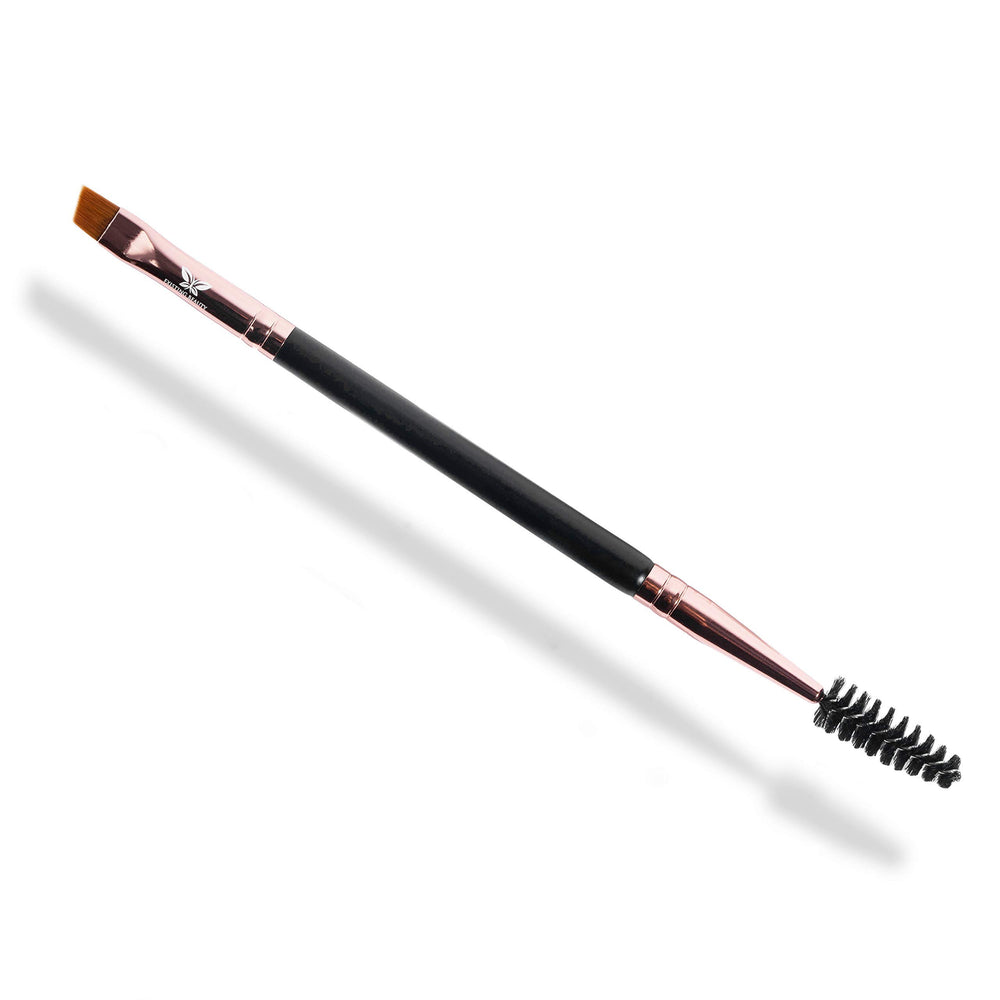 Existing Beauty brocha doble con punta angulada para cejas y pestañas, aplicación precisa.