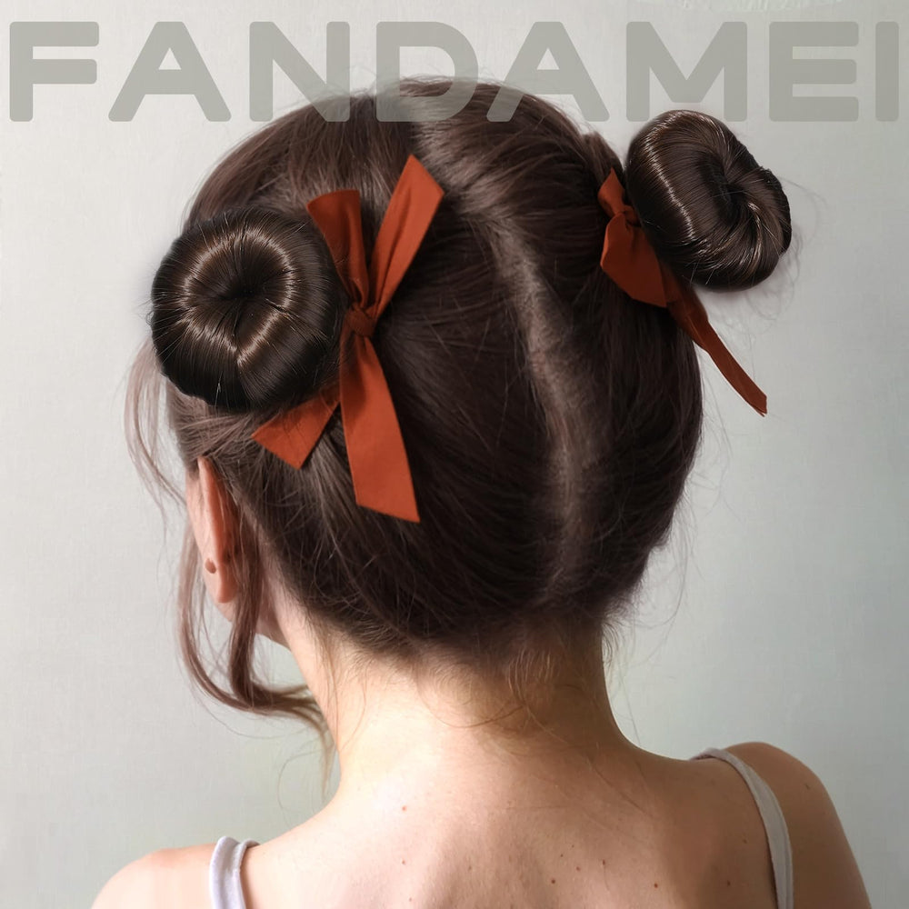 Fandamei tiras elasticas marrón para asegurar el moño y ajustar la tensión.