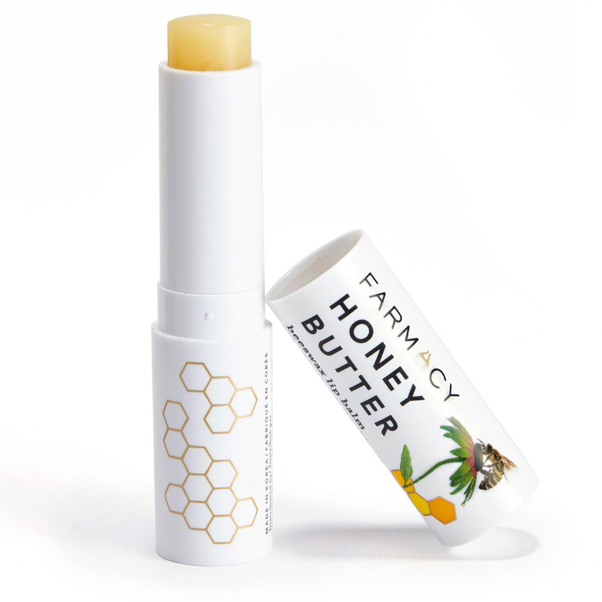 Farmacy Balsamo labial, envase visible, hidrata labios secos.