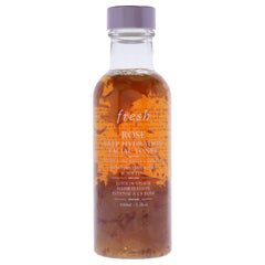 Fresh tonico rosa hidratacion profunda: botella elegante con petalos de rosa para hidratacion diaria