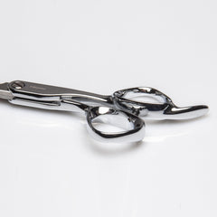 Fromm Explora dientes micro-serrados para distribución uniforme del cabello.