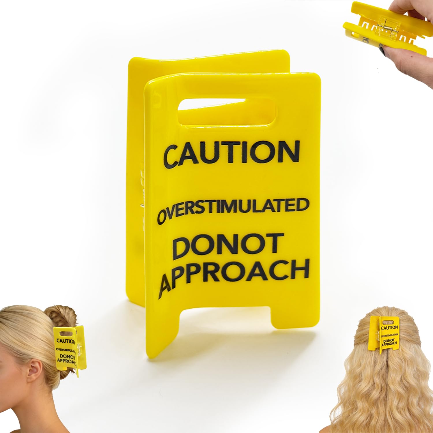 Pinza genérica para cabello con señal de precaución amarillo, ideal para expresar humor y practicidad
