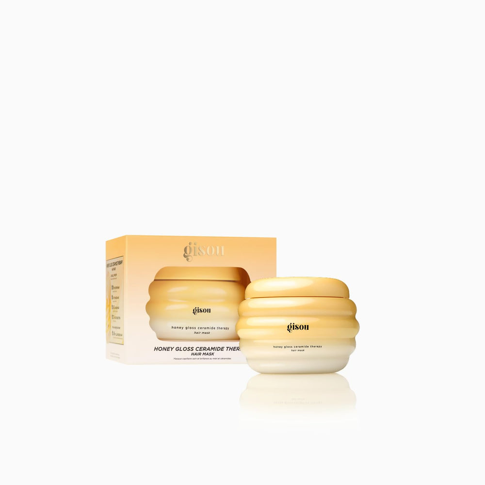 Gisou Honey Gloss Ceramide Therapy Mask Mini durante la aplicación, suaviza el cabello.