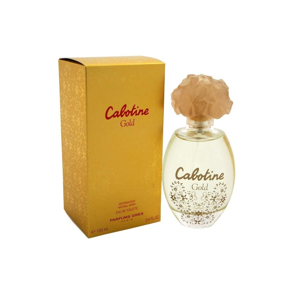 Primer plano del frasco de Gres Cabotine Gold, notas luminosas para diario.
