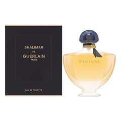 Guerlain Shalimar, botella dorada, fragancia icónica para momentos especiales.