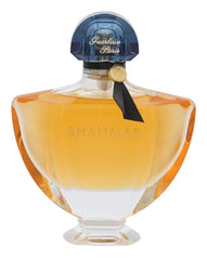 Guerlain Shalimar-tapon-zafiro, cierre visible que sugiere lujo duradero.