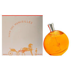 Hermès Elixir Des Merveilles, frasco de perfume, aroma seductor para ocasiones especiales.