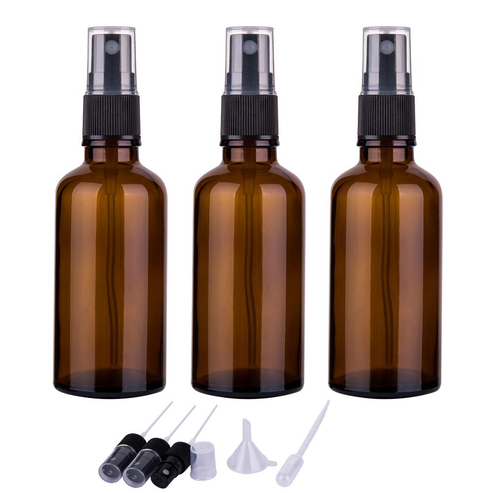 Juego de tres botellas de vidrio ámbar de 2oz para aceites esenciales y usos versátiles.