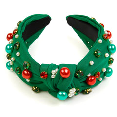 Diadema Huachi para Navidad, verde, con nudo y perlas para un look festivo.
