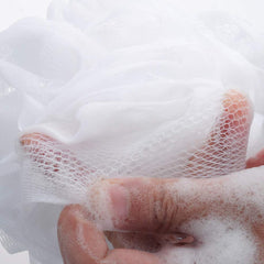Esponja iboodi lufa blanca con bucle para colgar.