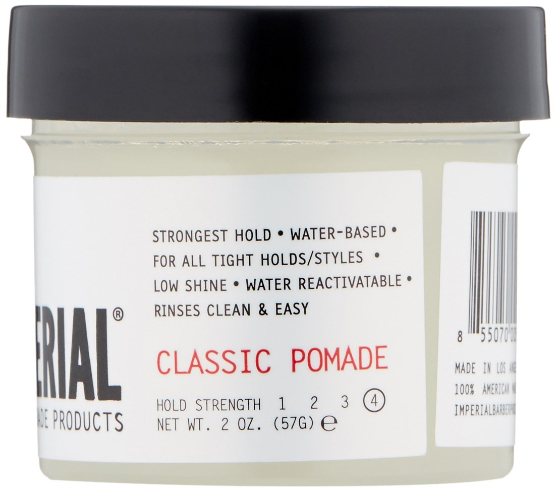 Imperial Barber Classic Pomade 2oz in hands showing adjustable hold for styling