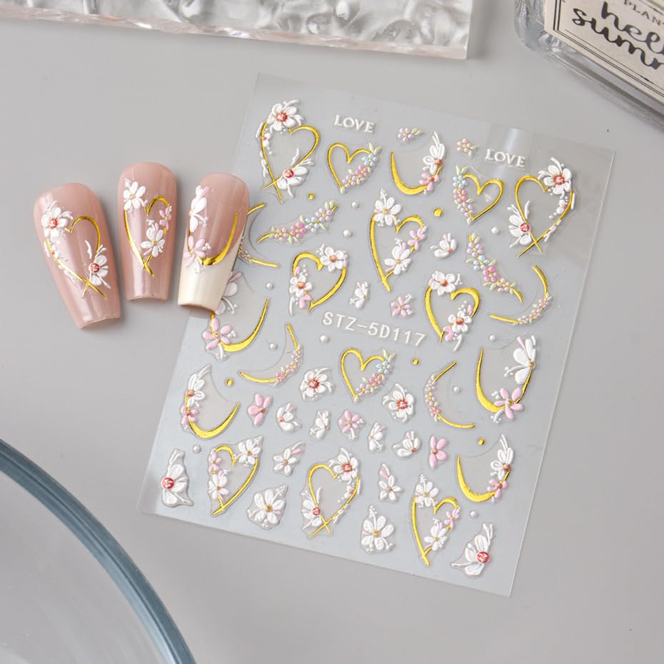 Conjunto de cuatro láminas para uñas con flores.