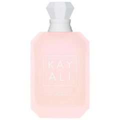 KAYALI Yum Boujee Marshmallow 81, botella en primer plano, fragancia cálida ideal para ocasiones especiales.