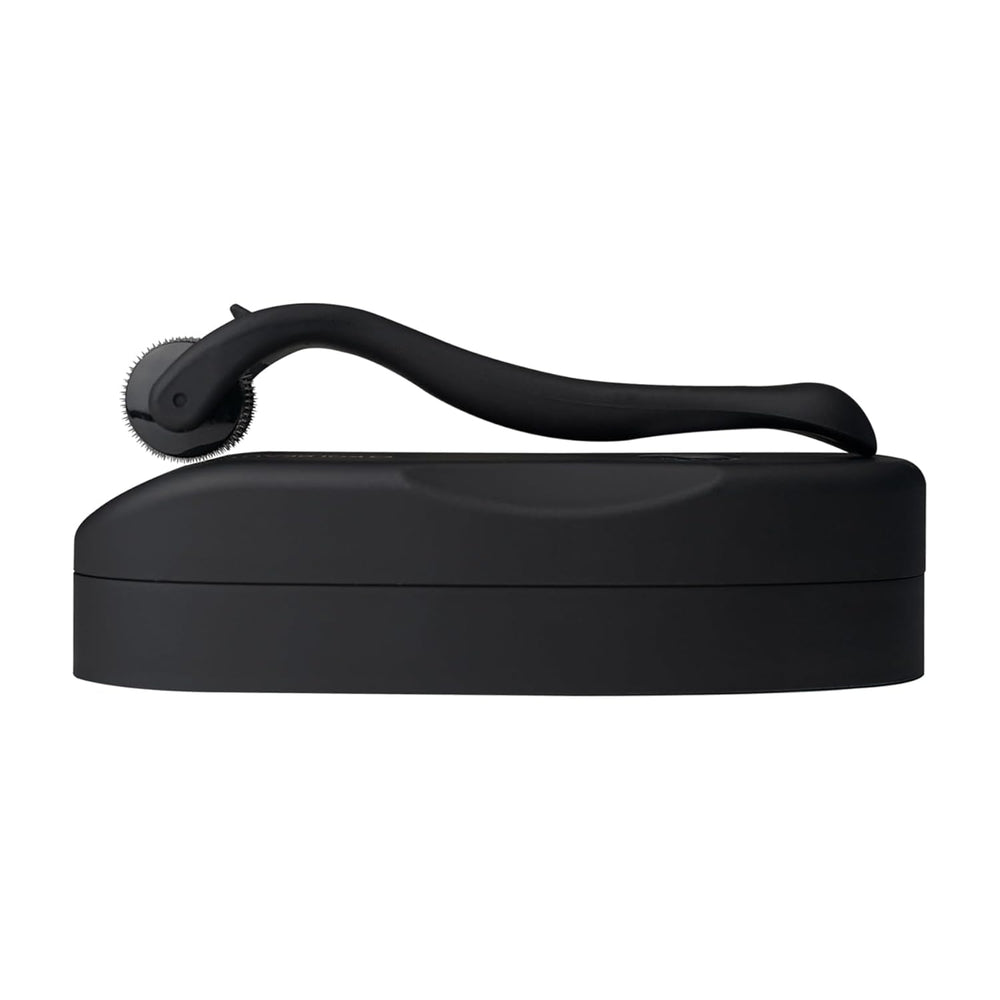 Koi Beauty premium microneedling roller with matte black grip for easy handling.