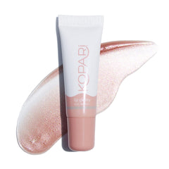 Kopari Brillo labial en tono nude para un brillo suave y natural.