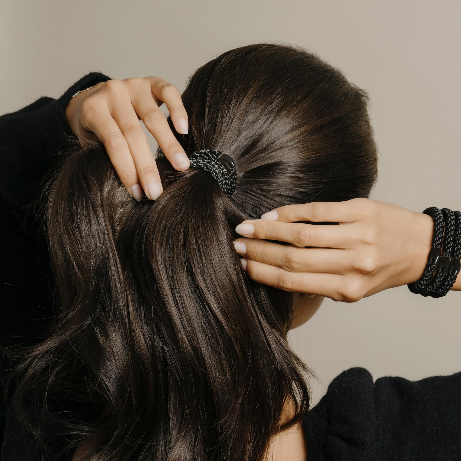 Closeup of braided polyester bands from L. Erickson hair ties.