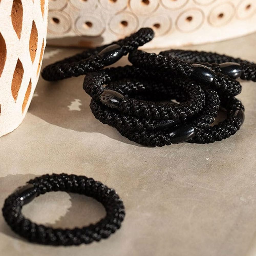 Daily styling accessory by L. Erickson for versatile looks.