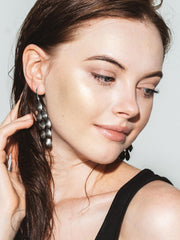L.A. Girl Shimmer Spray: uso facial para un resplandor sutil en la piel.
