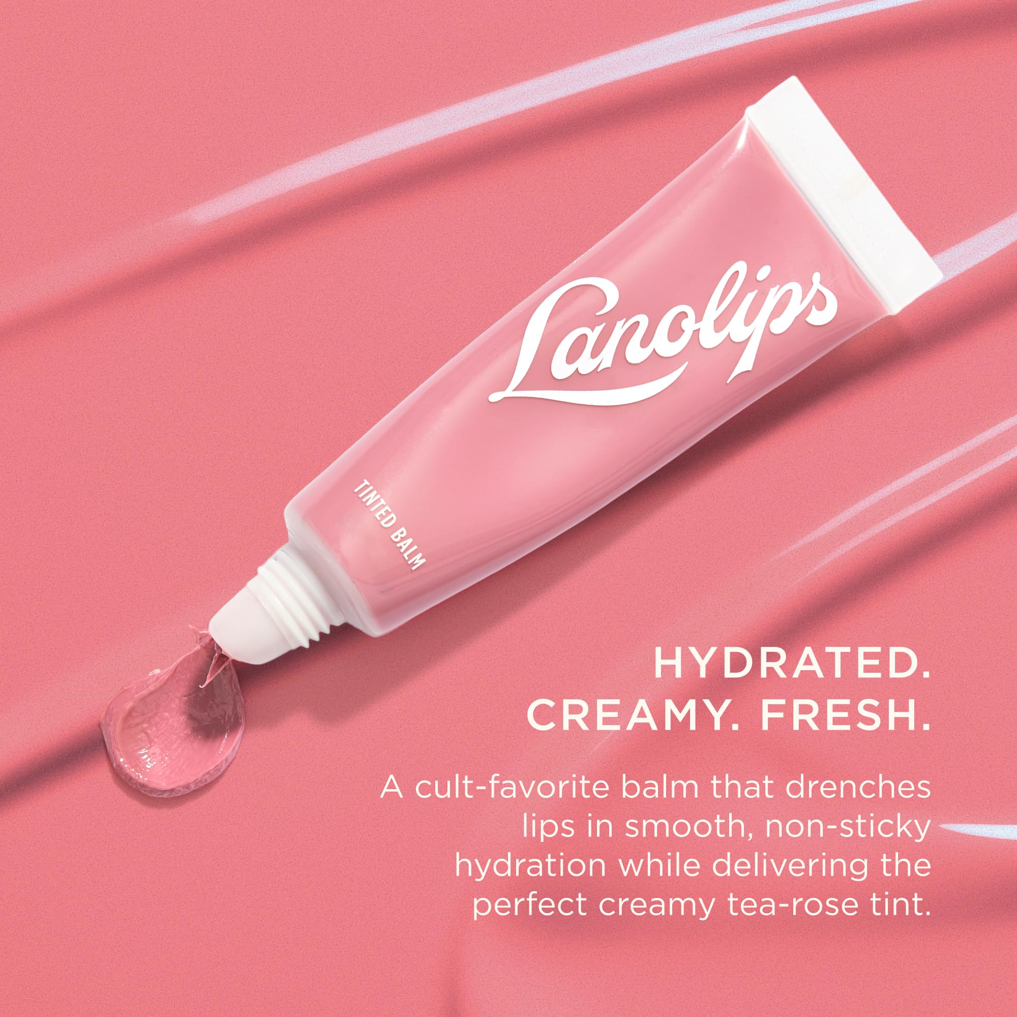 Lanolips bálsamo labial tintado rosa, aplicación suave para color sutil.