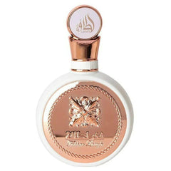 Lattafa Fakhar, botella floral en primer plano, ideal para presentaciones y cenas.