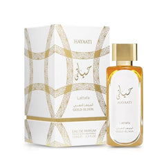 Lattafa Hayaati Gold Elixir, primer plano de etiqueta, experiencia lujosa y duradera