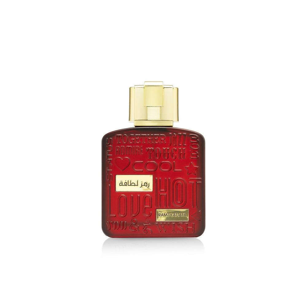 Lattafa Ramz Gold frasco dorado para exhibir una fragancia elegante y nocturna.