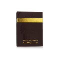 Lattafa Ramz Gold notas bergamota, manzana y piña, sensación fresca inicial.