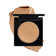 Laura Geller New York Concealer envase frontal con tono medio y cobertura uniforme.