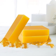 Lemon Turmeric Soap 3pc pack on skin suitable for face and body cleansing.