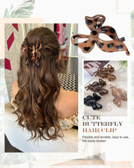 Pinza Lourny con moño gris, versátil para cualquier atuendo.
