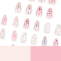 Uñas postizas LPOODDNU rosa con brillos, efecto glamoroso.