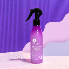 Luseta thermal protection spray mist showing even distribution before heat styling.