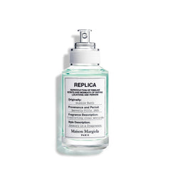Maison Margiela Replica Baño de Burbujas: botella lista para relajación con burbujas aromáticas.