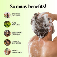 Maple Holistics Tea Tree Shampoo label closeup highlights natural cleansing ingredients.