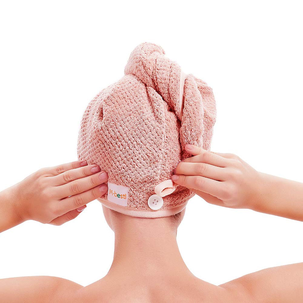 La mbestl-turbante-cabello-microfibra-boton garantiza ajuste cómodo durante el peinado.