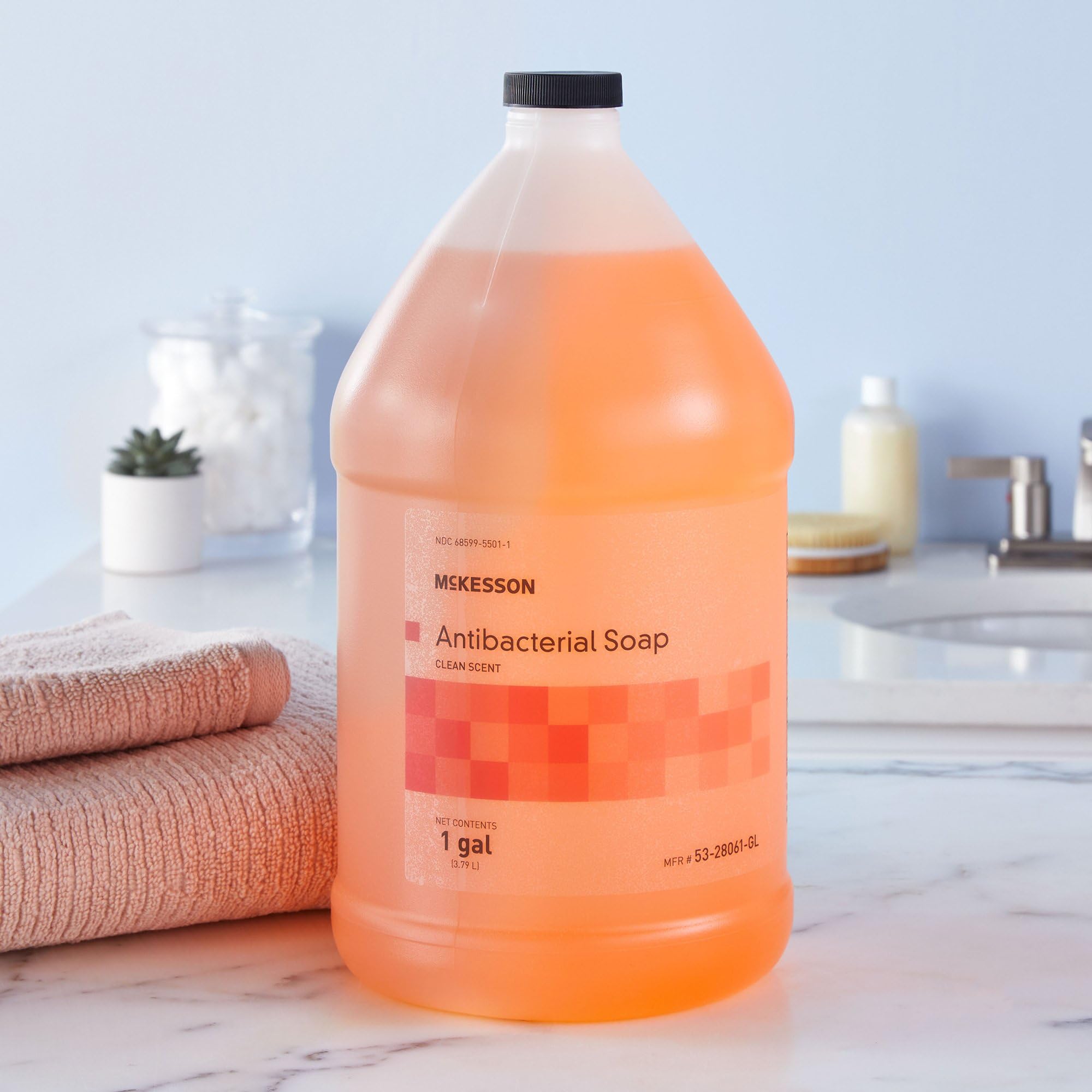Kitchen sink setup with McKesson hand soap ready for daily use.