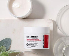 Textura crema suave de MEDI-PEEL Naite Thread Neck Cream para cuello.